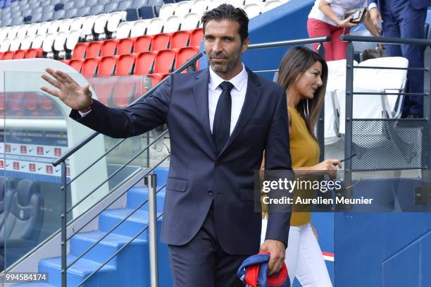 Gianluigi Buffon poses after signing with the Paris Saint-Germain Football Club at Parc des Princes on July 9, 2018 in Paris, France. Buffon signed...