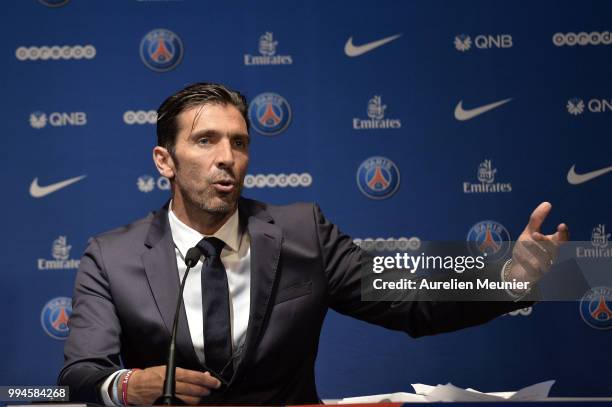 Gianluigi Buffon addresses the press during a press conference after signing with the Paris Saint-Germain Football Club at Parc des Princes on July...