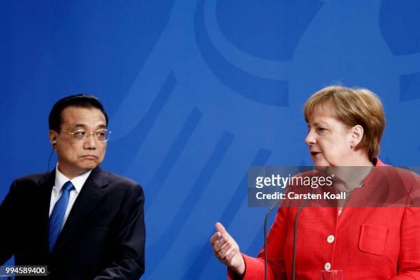 German Chancellor Angela Merkel and Chinese Premier Li Keqiang speak to the media following Germany-China government consultations on July 9, 2018 in...