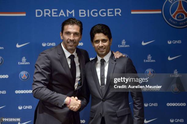 Gianluigi Buffon and Paris Saint-Germain President Nasser Al Khelaifi pose after signing with the Paris Saint-Germain Football Club at Parc des...