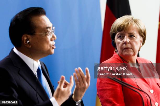 German Chancellor Angela Merkel and Chinese Premier Li Keqiang speak to the media following Germany-China government consultations on July 9, 2018 in...