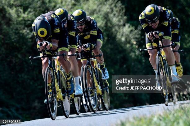 Riders of France's Direct Energie cycling team pedal during the third stage of the 105th edition of the Tour de France cycling race, a 35.5 km team...