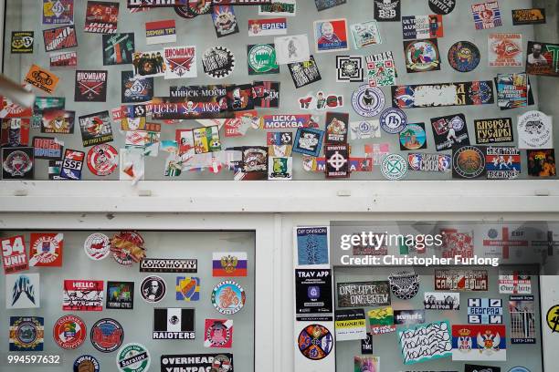 Football fan stickers from across the world adorn a doorway near Red Square ahead of the World Cup semi-final game between England and Croatia on...