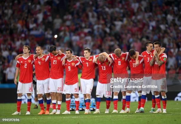 The Russia team look on during the penalty shoot out during the 2018 FIFA World Cup Russia Quarter Final match between Russia and Croatia at Fisht...