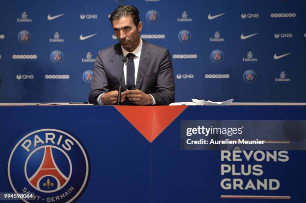 Gianluigi Buffon addresses the press during a press conference after signing with the Paris Saint-Germain Football Club at Parc des Princes on July...