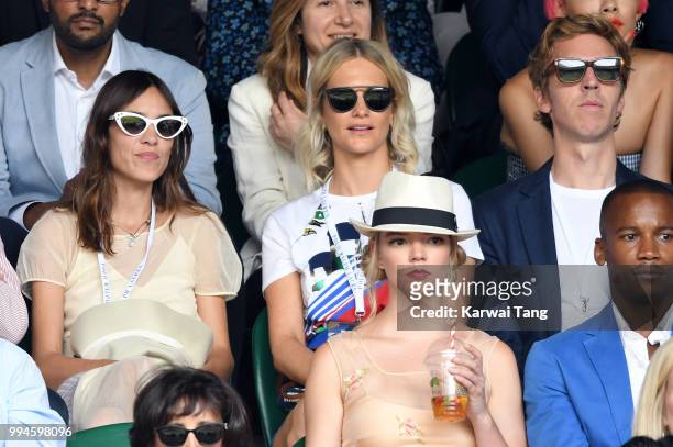 Alexa Chung, Poppy Delevingne, her husband James Cook and Anya Taylor-Joy attend day seven of the Wimbledon Tennis Championships at the All England...