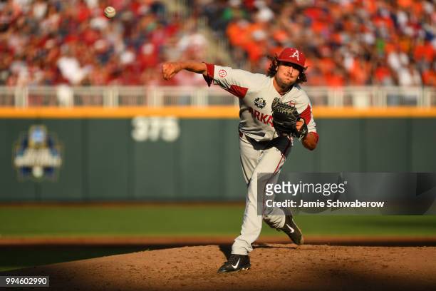 Blaine Knight of the Arkansas Razorbacks pitches against the Oregon State Beavers during the Division I Men's Baseball Championship held at TD...