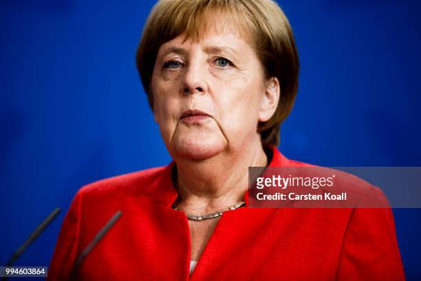 German Chancellor Angela Merkel speaks to the media together with Chinese Premier Li Keqiang during Germany-China government consultations on July 9,...
