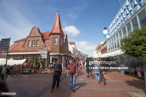 Buesum, harbor place directly at the Nort Sea. Scene in the city center of Buesum.