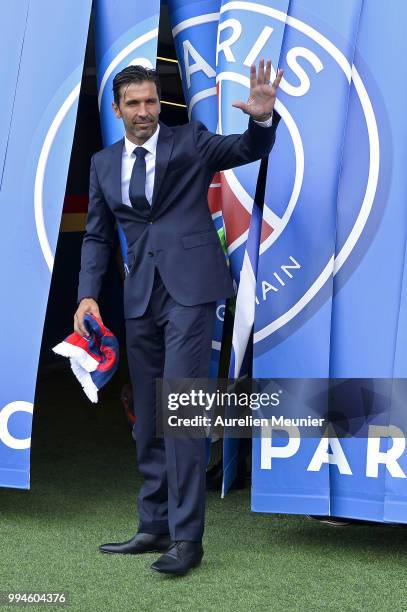 Gianluigi Buffon poses after signing with the Paris Saint-Germain Football Club at Parc des Princes on July 9, 2018 in Paris, France. Buffon signed...