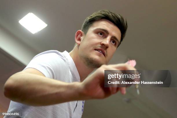 Harry Maguire of England plays darts at Repino Cronwell Park Hotel on July 9, 2018 in Saint Petersburg, Russia.