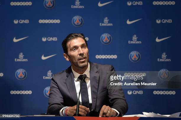 Gianluigi Buffon addresses the press during a press conference after signing with the Paris Saint-Germain Football Club at Parc des Princes on July...