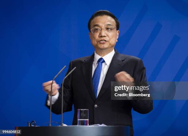 Li Keqiang, China's premier, gestures while speaking during a news conference at the Chancellery building in Berlin, Germany, on Monday, July 9,...