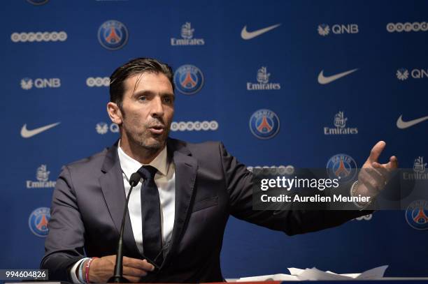 Gianluigi Buffon addresses the press during a press conference after signing with the Paris Saint-Germain Football Club at Parc des Princes on July...