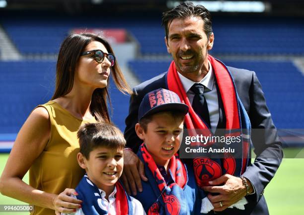 Paris Saint Germain's new goalkeeper Gianluigi Buffon poses after his official presentation press conference with his wife Alena Seredova , his sons...