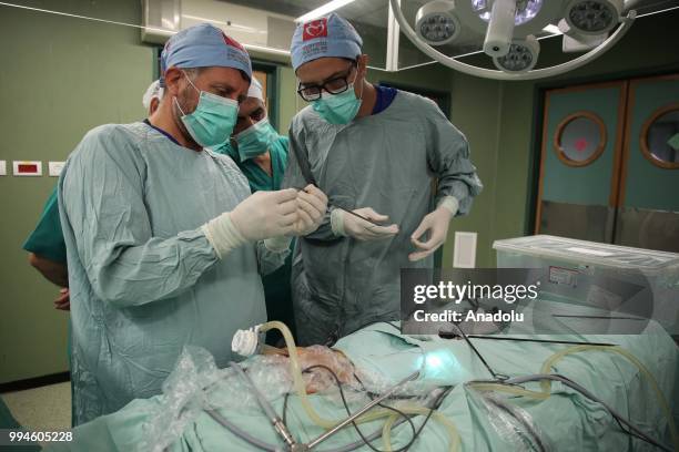 Members of Doctors Worldwide begin surgical operations with their Palestinian counterparts at al-Shifa hospital in Gaza City, Gaza on July 9, 2018