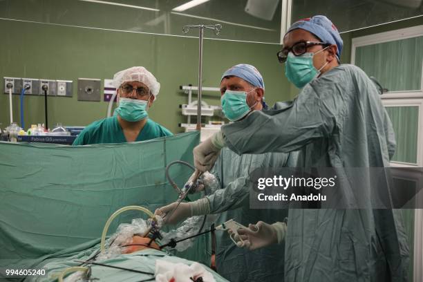 Members of Doctors Worldwide begin surgical operations with their Palestinian counterparts at al-Shifa hospital in Gaza City, Gaza on July 9, 2018