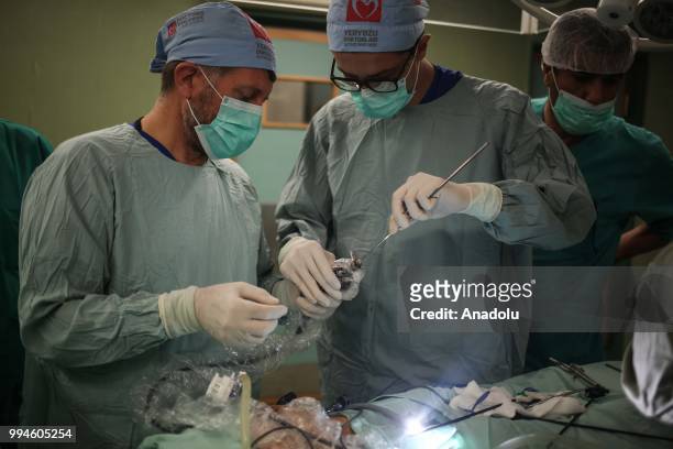 Members of Doctors Worldwide begin surgical operations with their Palestinian counterparts at al-Shifa hospital in Gaza City, Gaza on July 9, 2018