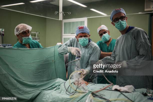 Members of Doctors Worldwide begin surgical operations with their Palestinian counterparts at al-Shifa hospital in Gaza City, Gaza on July 9, 2018