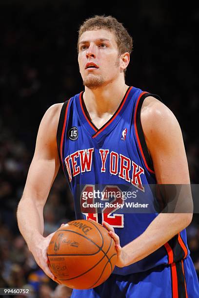 David Lee of the New York Knicks shoots a free throw during the game against the Golden State Warriors at Oracle Arena on April 2, 2010 in Oakland,...