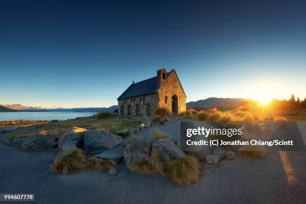 sunlit church - tekapo stock pictures, royalty-free photos & images