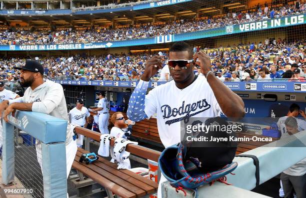 Yasiel Puig of the Los Angeles Dodgers heads on to the field during the game against the Pittsburgh Pirates at Dodger Stadium on July 4, 2018 in Los...