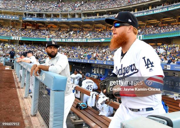 Justin Turner of the Los Angeles Dodgers heads on to the field during the game against the Pittsburgh Pirates at Dodger Stadium on July 4, 2018 in...