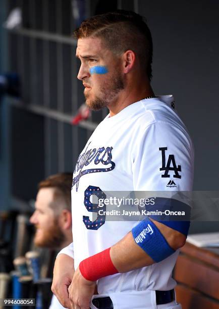 Yasmani Grandal of the Los Angeles Dodgers in the dugout during the game against the Pittsburgh Pirates at Dodger Stadium on July 4, 2018 in Los...