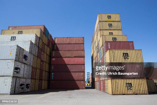 Gateway to the world - the container port in Hamburg - stored containers.