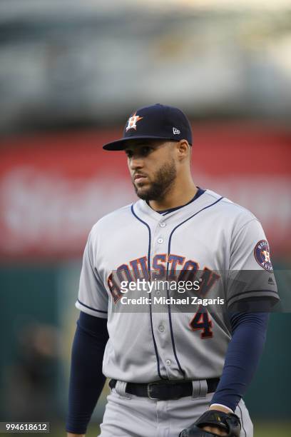 George Springer of the Houston Astros stands on the field during the game against the Oakland Athletics at the Oakland Alameda Coliseum on June 12,...
