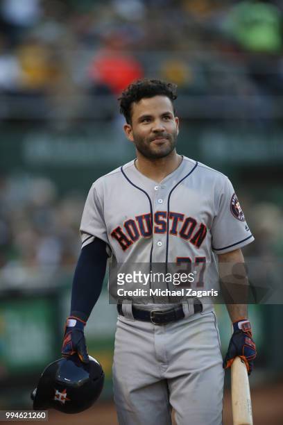 Jose Altuve of the Houston Astros stands on the field during the game against the Oakland Athletics at the Oakland Alameda Coliseum on June 12, 2018...
