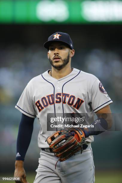 Carlos Correa of the Houston Astros stands on the field during the game against the Oakland Athletics at the Oakland Alameda Coliseum on June 12,...