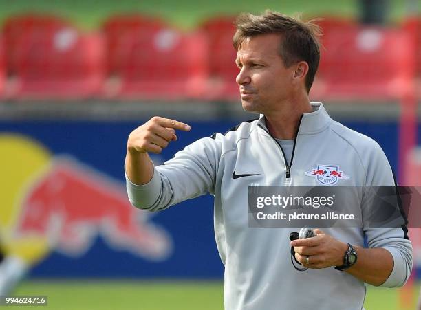 July 2018, Germany, Leipzig: soccer, Bundesliga, RB Leipzig training session, Cottaweg training centre. RB Leipzig assistant coach Jesse Marsch gives...