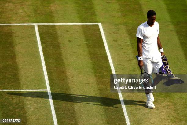 Gael Monfils of France reacts against Kevin Anderson of South Africa during their Men's Singles fourth round match on day seven of the Wimbledon Lawn...