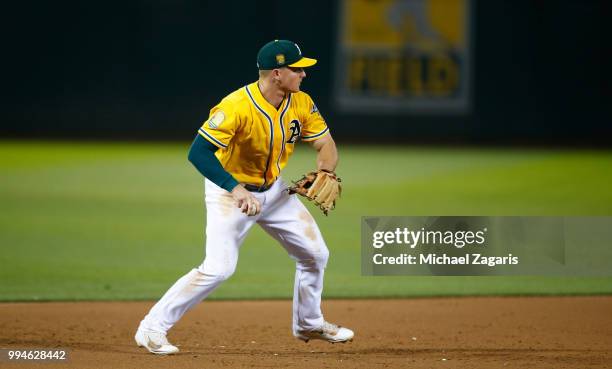 Matt Chapman of the Oakland Athletics fields during the game against the Houston Astros at the Oakland Alameda Coliseum on June 12, 2018 in Oakland,...