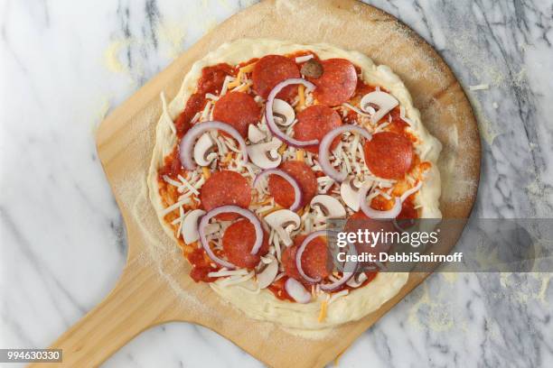 making a pizza - raw stock pictures, royalty-free photos & images