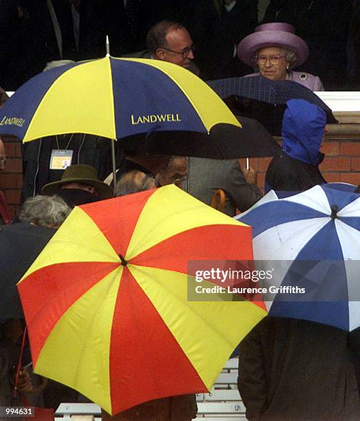 The Queen waits for the rain in the pavilion during the Second Npower Test between England and Australia at Lord's, London. DIGITAL IMAGE Mandatory...