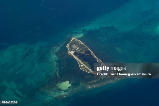 the pratas islands in south china sea daytime aerial view from airplane - south china sea stock pictures, royalty-free photos & images