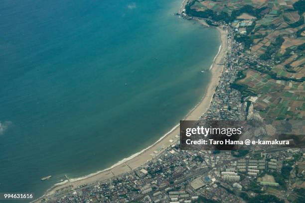 tokyo bay and miura beach in miura city in japan daytime aerial view from airplane - präfektur kanagawa stock-fotos und bilder