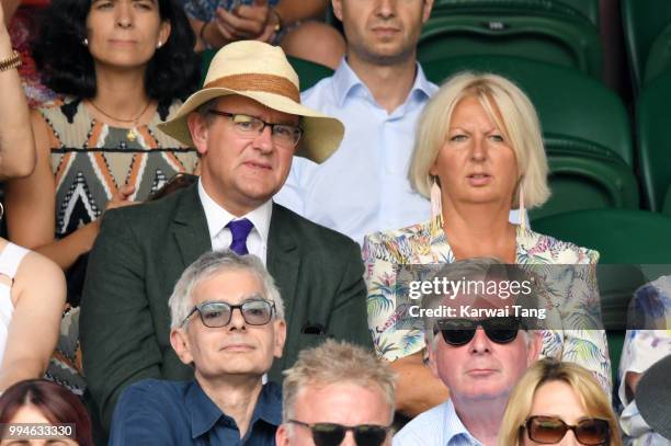 Hugh Bonneville and his wife Lulu Evans attend day seven of the Wimbledon Tennis Championships at the All England Lawn Tennis and Croquet Club on...