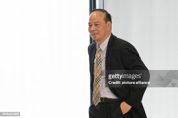 July 2018, Germany, Berlin: the CEO of the Chinese battery producer Contemporary Amperex Technology Ltd. , Dr. Robin Zeng, arrives for a press...