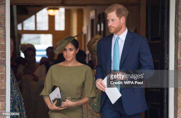 The Duke and Duchess of Sussex depart after attending the christening of Prince Louis at the Chapel Royal, St James's Palace on July 09, 2018 in...