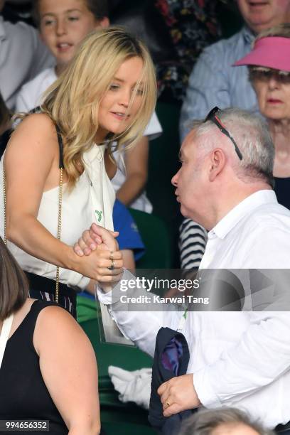 Laura Whitmore and Eamonn Holmes attend day seven of the Wimbledon Tennis Championships at the All England Lawn Tennis and Croquet Club on July 9,...