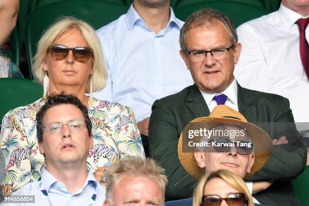 Hugh Bonneville and his wife Lulu Evans attend day seven of the Wimbledon Tennis Championships at the All England Lawn Tennis and Croquet Club on...