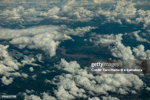 clouds on mekong river in champasak province in laos daytime aerial view from airplane - champasak stock pictures, royalty-free photos & images