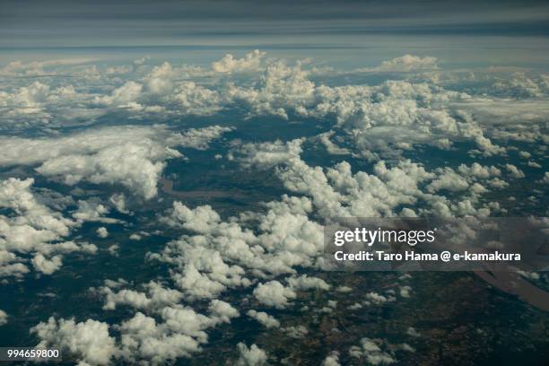 clouds on mekong river in champasak province in laos daytime aerial view from airplane - champasak stock pictures, royalty-free photos & images