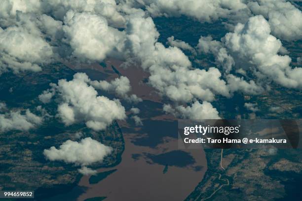 clouds on mekong river in champasak province in laos daytime aerial view from airplane - champasak stock pictures, royalty-free photos & images