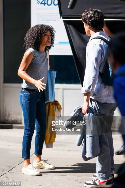 Yara Shahidi and Charles Melton are seen filming 'The Sun Is Also a Star' in Chelsea on July 9, 2018 in New York City.