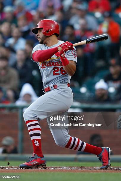 Tommy Pham of the St Louis Cardinals hits a single in the first inning against the San Francisco Giants at AT&T Park on July 5, 2018 in San...