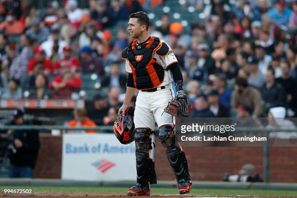 Catcher Buster Posey of the San Francisco Giants looks on during the first inning of the game against the St Louis Cardinals at AT&T Park on July 5,...